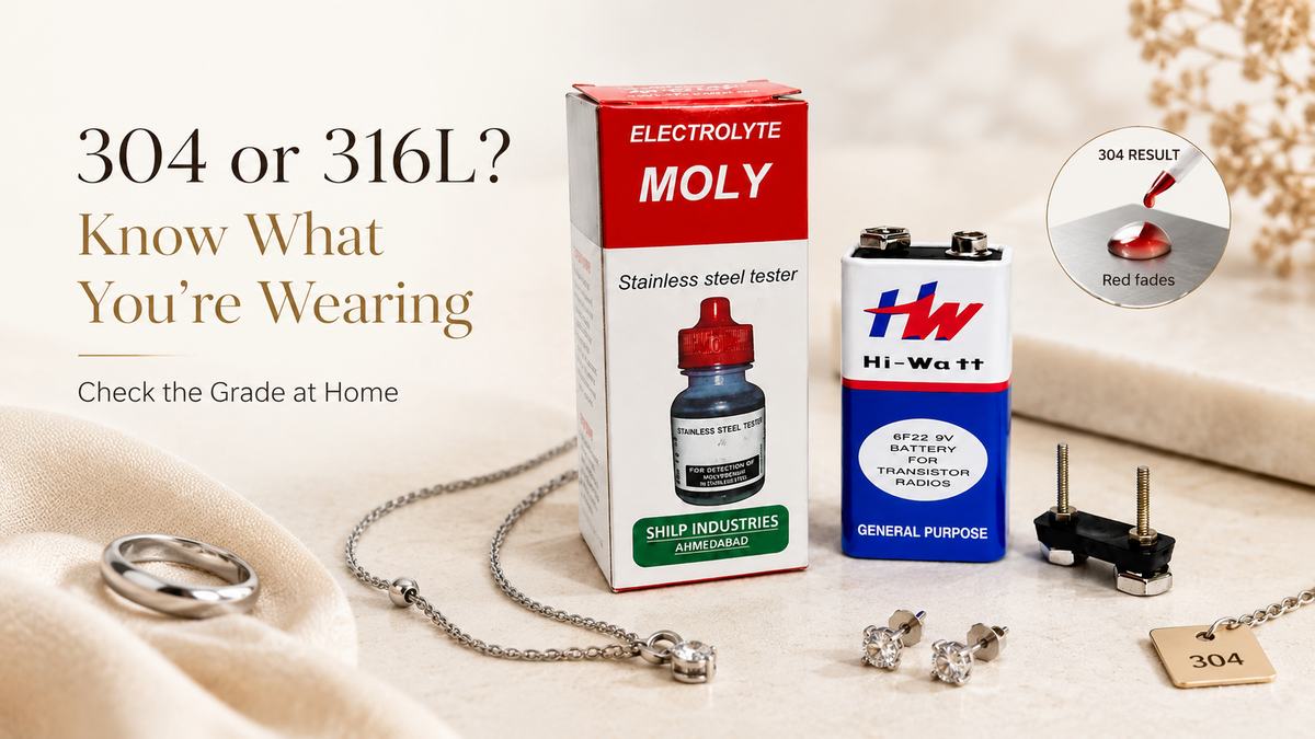 MOLY stainless steel testing liquid used to check the grade of stainless steel jewellery, next to rings and a chain